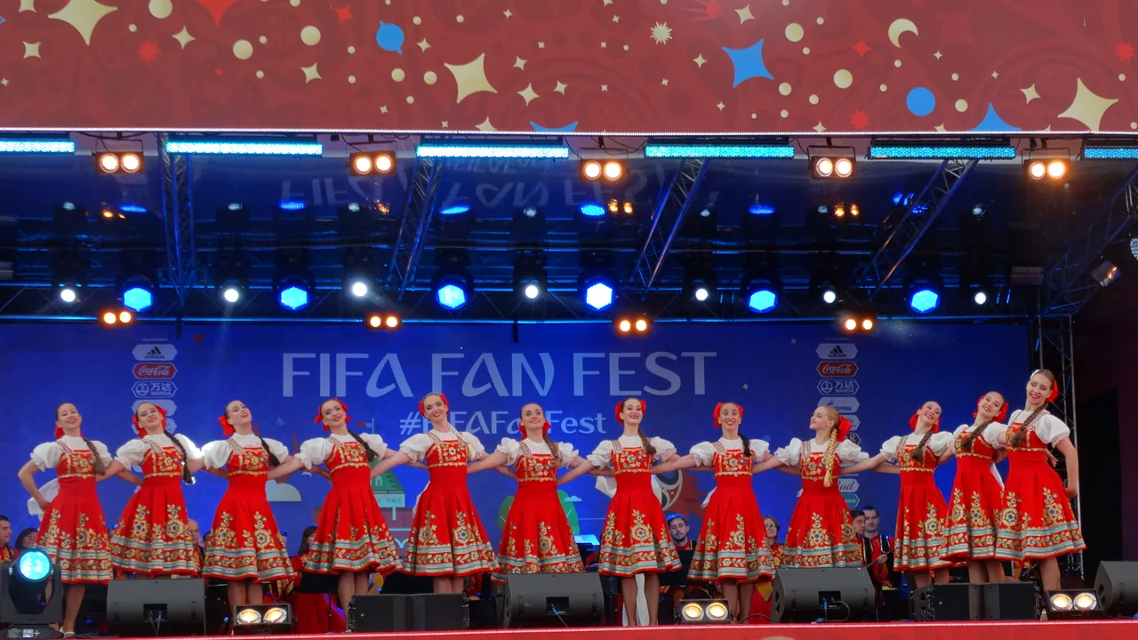Multi-flag fan festival outside a World Cup stadium — World Cup 2026 Group I preview covering France, Senegal, Norway and Iraq, with the France vs Senegal opener at MetLife on June 16 as the headline storyline