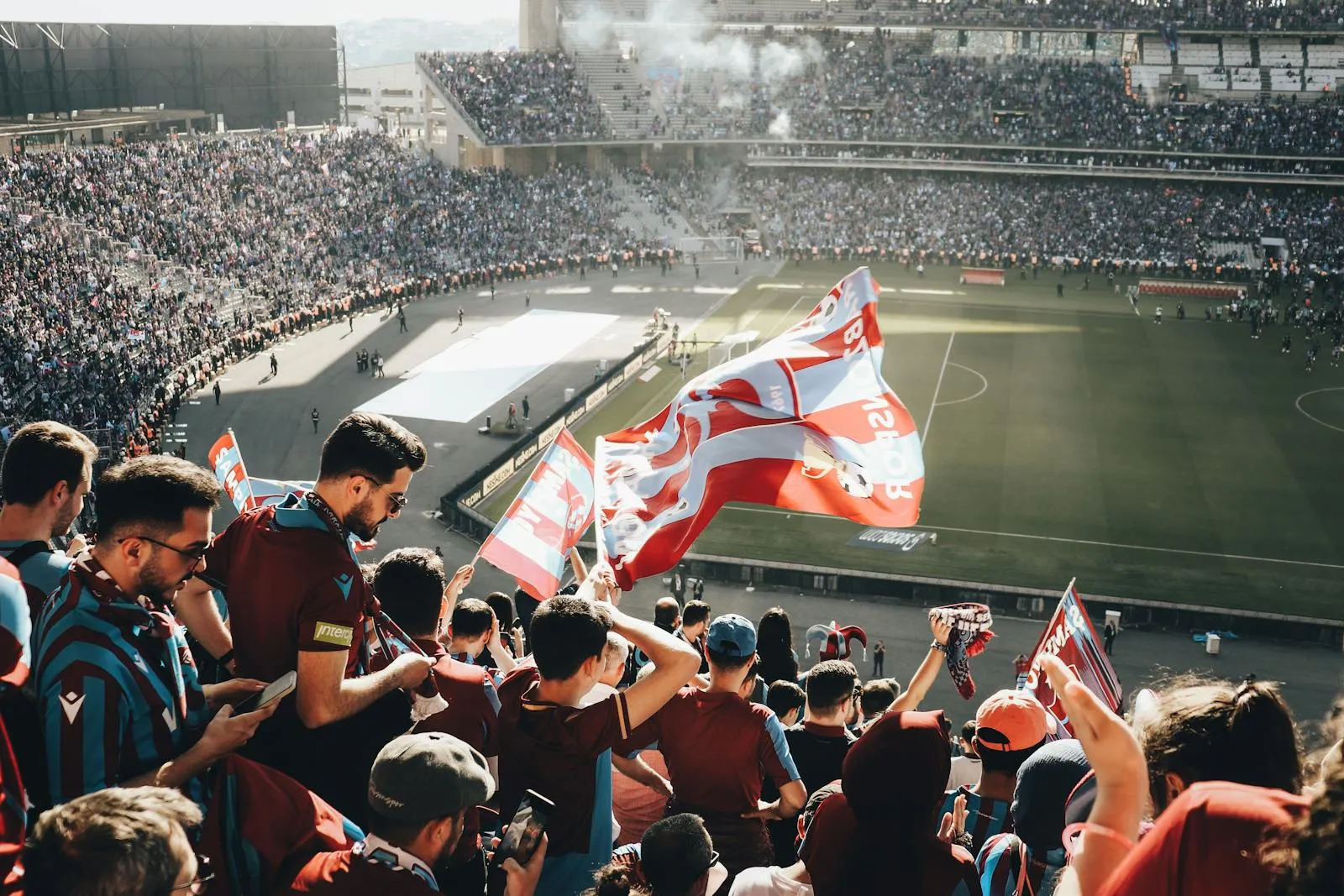 Multiple national flags waving in the stands — 2026 World Cup title favourites preview